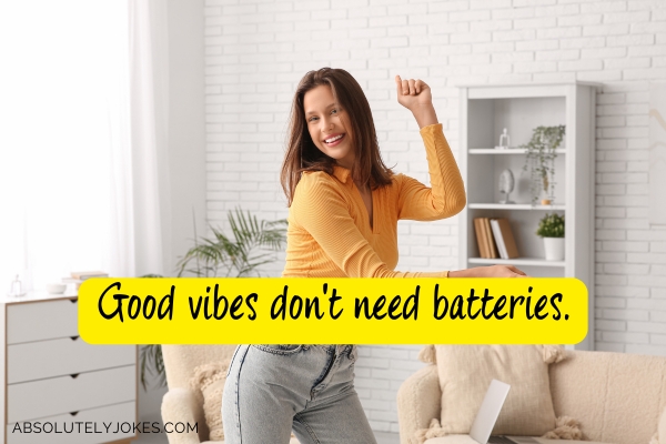 woman happily dancing at home with quote overlay